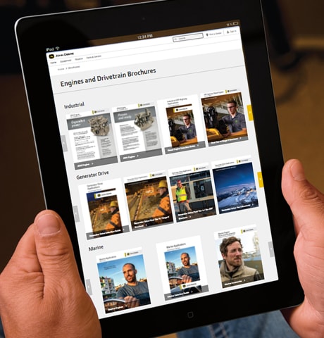 Un iPad affiche la page Moteurs et transmission du site Web Deere.com