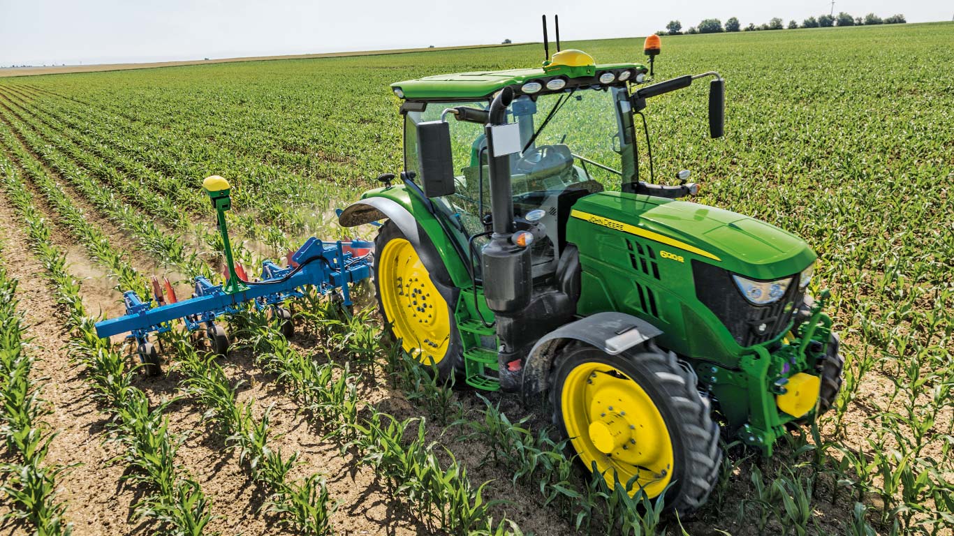 John Deere Active Implement Guidance intégré au tracteur